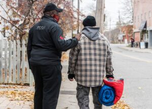 Volunteer helping unhoused Veteran